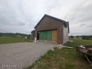 238 Thacker Rd, Grimsley, TN 38565 - view of home's exterior featuring a garage