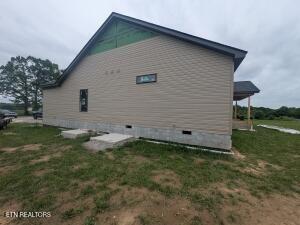 238 Thacker Rd, Grimsley, TN 38565 - view of home's exterior featuring crawl space