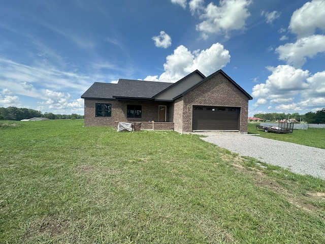 238 Thacker Rd, Grimsley, TN 38565 - ranch-style house with brick siding, a garage, gravel driveway, and a front yard