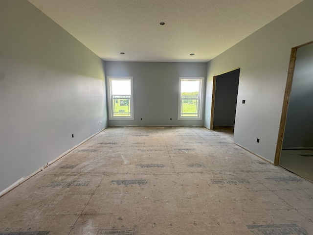 238 Thacker Rd, Grimsley, TN 38565 - empty room featuring baseboards and a textured ceiling