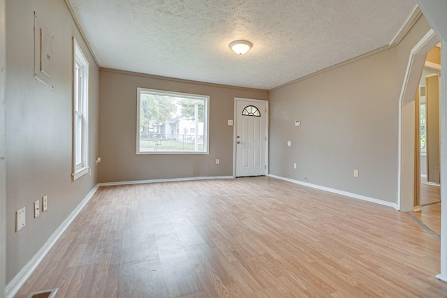 300 E Highland Dr, Columbia, TN 38401 - interior space featuring ornamental molding, baseboards, light wood-type flooring, and a textured ceiling