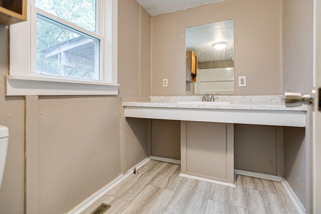 300 E Highland Dr, Columbia, TN 38401 - bathroom with visible vents and vanity