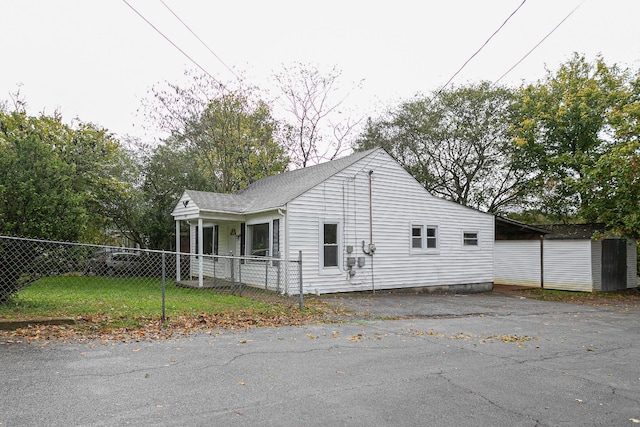300 E Highland Dr, Columbia, TN 38401 - view of property exterior featuring covered porch and fence