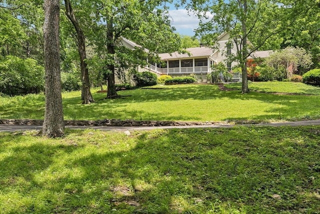 2000 Otter Creek Rd, Nashville, TN 37215 - view of grassy yard featuring a sunroom
