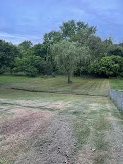 view of yard with a forest view