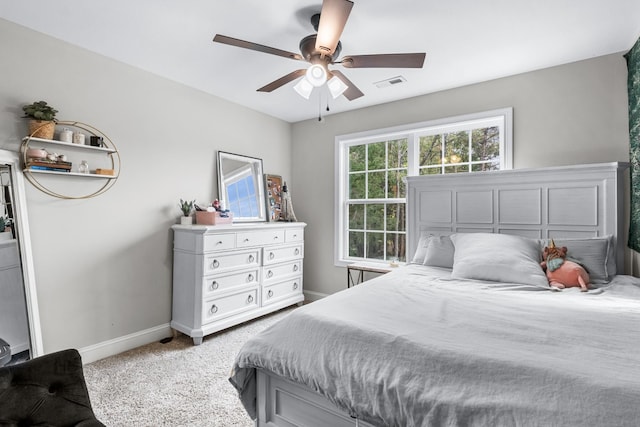 1289 Southside Rd, Southside, TN 37171 - carpeted bedroom with baseboards, visible vents, and ceiling fan