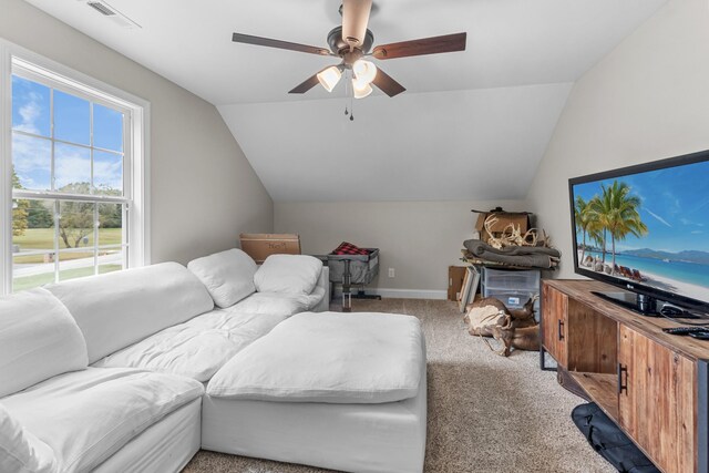 1289 Southside Rd, Southside, TN 37171 - living area featuring visible vents, a ceiling fan, baseboards, carpet, and lofted ceiling