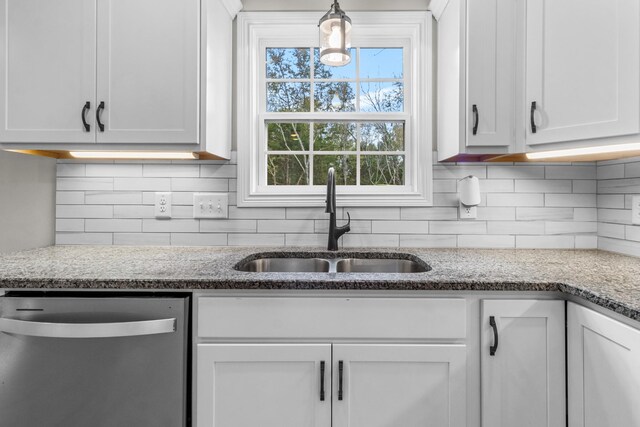 1289 Southside Rd, Southside, TN 37171 - kitchen featuring a sink, tasteful backsplash, stainless steel dishwasher, white cabinetry, and hanging light fixtures