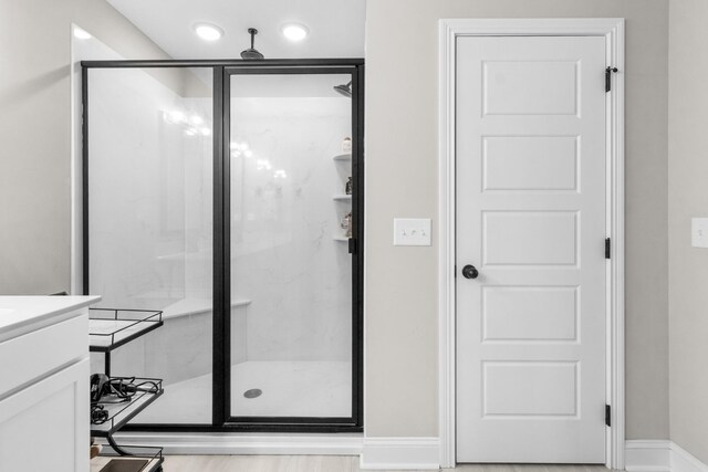 1289 Southside Rd, Southside, TN 37171 - bathroom featuring baseboards, a stall shower, and vanity
