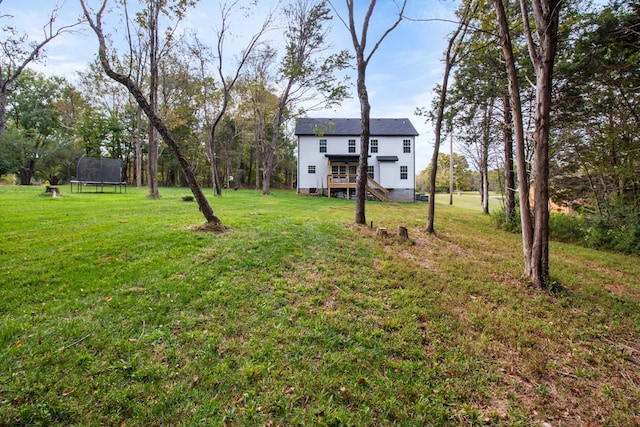 1289 Southside Rd, Southside, TN 37171 - view of yard featuring stairway and a trampoline