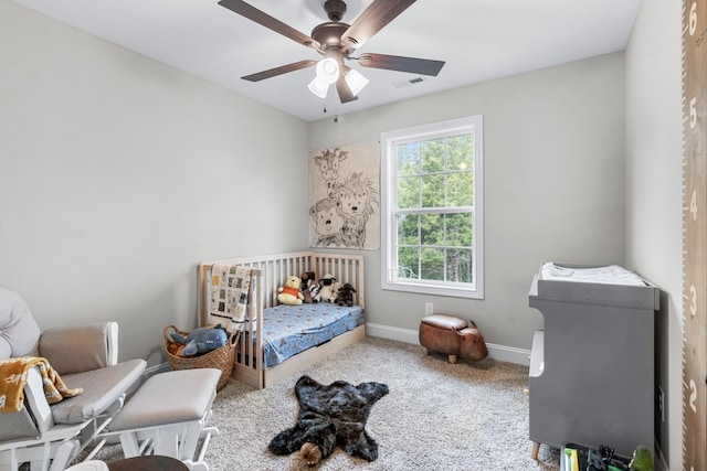 1289 Southside Rd, Southside, TN 37171 - carpeted bedroom featuring a ceiling fan, visible vents, and baseboards