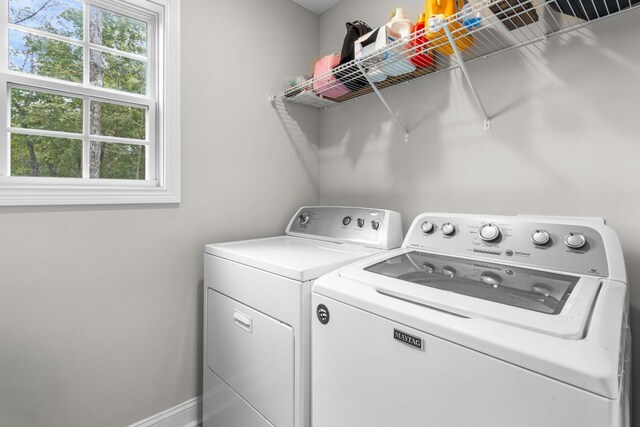 1289 Southside Rd, Southside, TN 37171 - laundry room with washing machine and clothes dryer, laundry area, and baseboards
