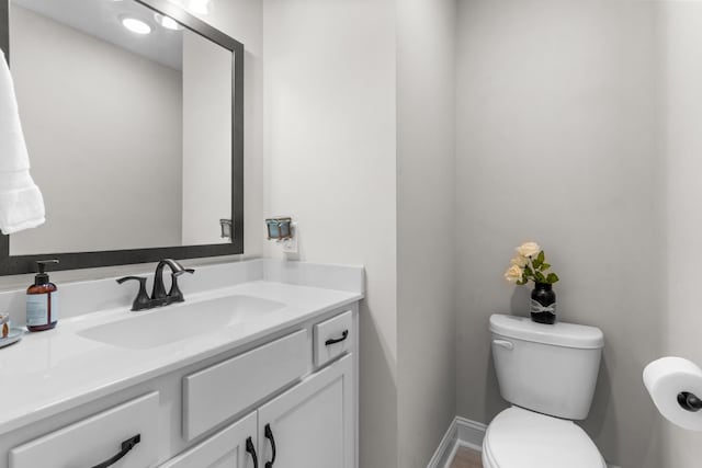 1289 Southside Rd, Southside, TN 37171 - half bathroom with baseboards, toilet, and vanity