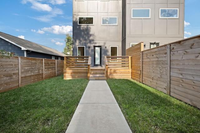 1815 14th Ave N Unit B, Nashville, TN 37208 - back of property featuring a yard, board and batten siding, and a fenced backyard