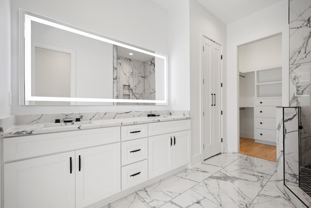 1815 14th Ave N Unit B, Nashville, TN 37208 - full bath featuring a marble finish shower, a sink, marble finish floor, and double vanity