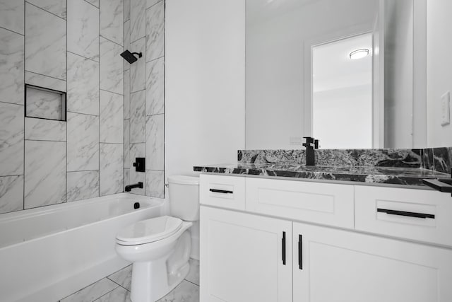 1815 14th Ave N Unit B, Nashville, TN 37208 - bathroom featuring toilet, marble finish floor, washtub / shower combination, and vanity