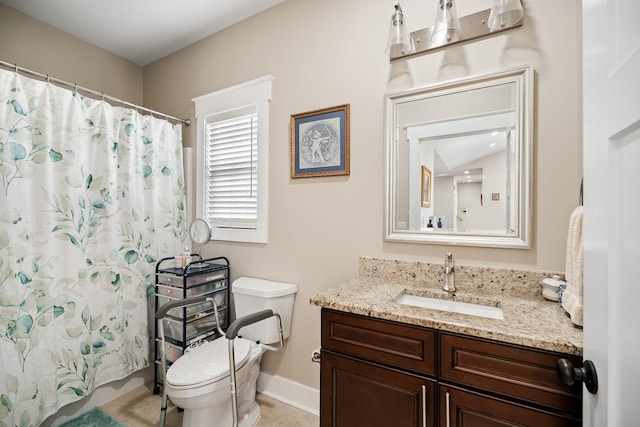 bathroom featuring toilet, vanity, baseboards, and a shower with curtain