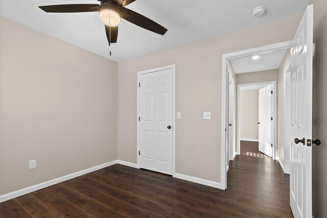 530 S Oak St, Hohenwald, TN 38462 - interior space featuring ceiling fan, baseboards, and dark wood finished floors