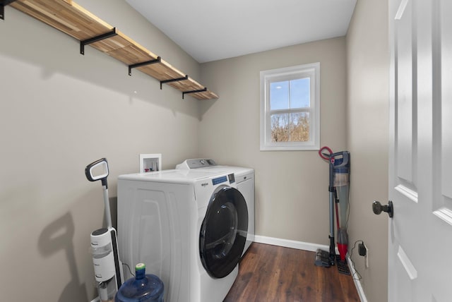 530 S Oak St, Hohenwald, TN 38462 - laundry room featuring baseboards, washer and dryer, laundry area, and dark wood-style floors