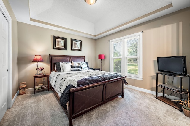 1712 Lake Grassland W, Gallatin, TN 37066 - carpeted bedroom featuring a textured ceiling, baseboards, and a tray ceiling