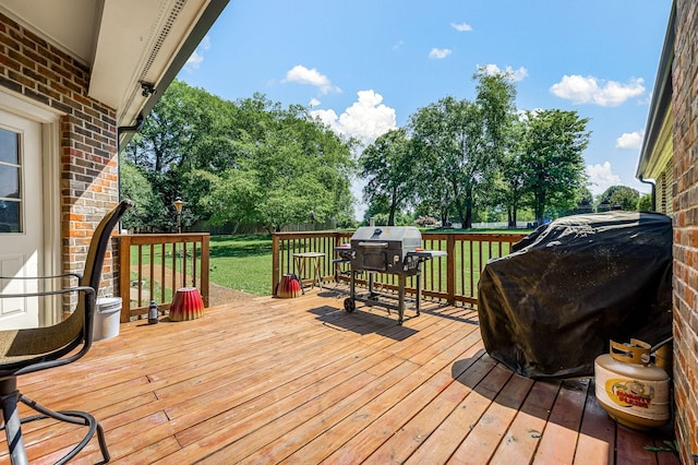 1712 Lake Grassland W, Gallatin, TN 37066 - wooden deck featuring grilling area and a lawn