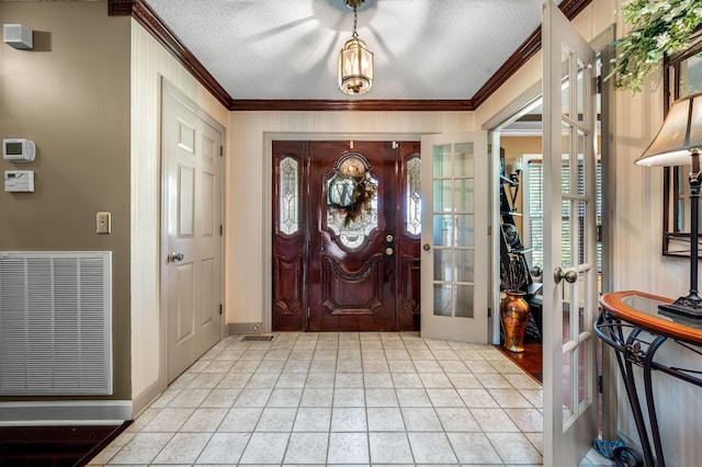 1712 Lake Grassland W, Gallatin, TN 37066 - entryway featuring a textured ceiling, french doors, visible vents, and ornamental molding