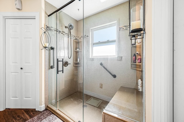 1712 Lake Grassland W, Gallatin, TN 37066 - full bathroom with a closet, a stall shower, and wood finished floors