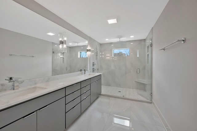 1815 Martin St Unit A, Nashville, TN 37203 - bathroom featuring a shower stall, double vanity, recessed lighting, and marble finish flooring