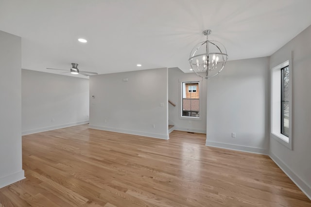 1815 Martin St Unit A, Nashville, TN 37203 - unfurnished room with a chandelier, recessed lighting, light wood-type flooring, stairway, and a ceiling fan