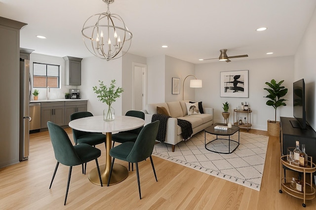 1815 Martin St Unit A, Nashville, TN 37203 - dining area with light wood-type flooring, a chandelier, recessed lighting, and a ceiling fan