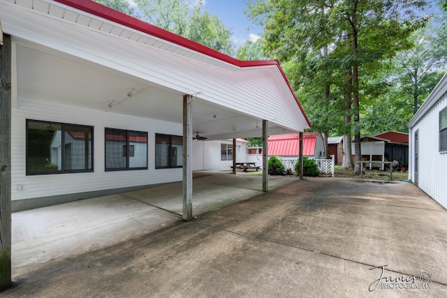 exterior space with a carport