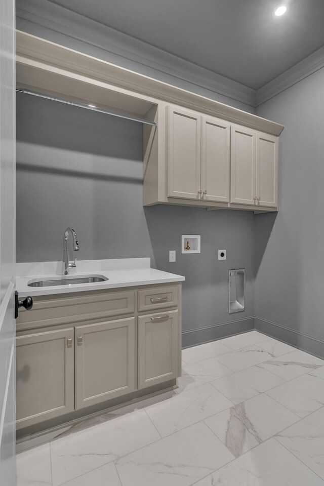 7004 Twelve Corners Rd, Lascassas, TN 37085 - washroom with electric dryer hookup, hookup for a washing machine, light marble finish floors, crown molding, and cabinet space