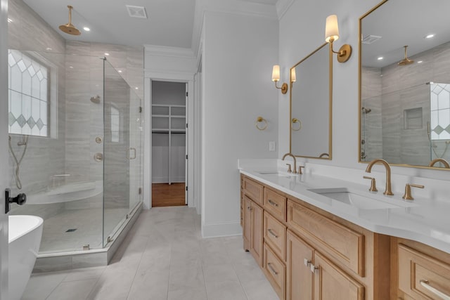 7004 Twelve Corners Rd, Lascassas, TN 37085 - full bathroom featuring a stall shower, double vanity, recessed lighting, ornamental molding, and tile patterned flooring