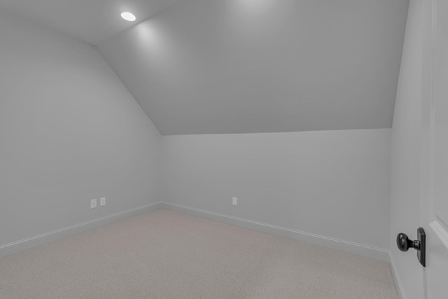 7004 Twelve Corners Rd, Lascassas, TN 37085 - bonus room with lofted ceiling, carpet floors, and baseboards