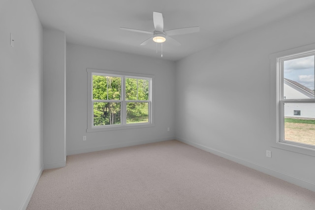 7004 Twelve Corners Rd, Lascassas, TN 37085 - empty room with light carpet, baseboards, and a ceiling fan