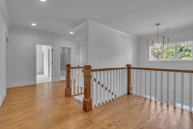 7004 Twelve Corners Rd, Lascassas, TN 37085 - hall featuring an upstairs landing, wood finished floors, a chandelier, crown molding, and recessed lighting