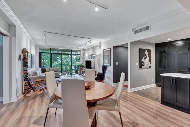 155 Harpeth Trace Smt, Nashville, TN 37221 - dining space with track lighting, baseboards, light wood-style flooring, and ornamental molding