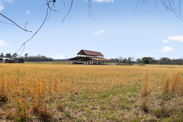 view of yard with a gazebo and a rural view