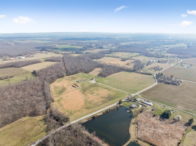 birds eye view of property with a rural view and a water view