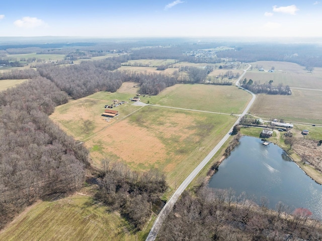 drone / aerial view featuring a rural view and a water view