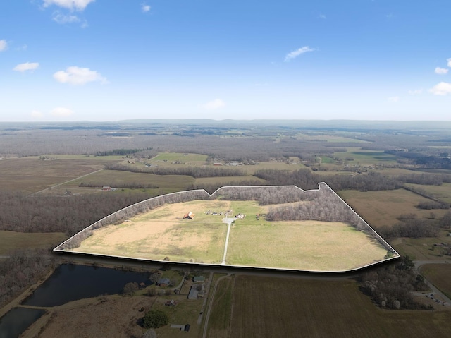 drone / aerial view with a rural view and a water view