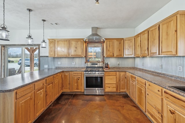 kitchen featuring stainless steel gas range oven, visible vents, wall chimney range hood, a peninsula, and plenty of natural light