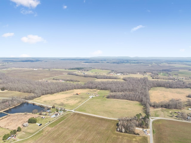 aerial view featuring a rural view and a water view