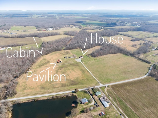 drone / aerial view with a rural view and a water view