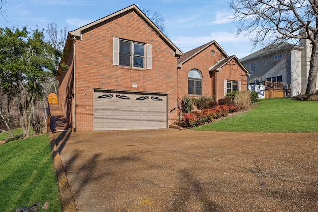 traditional home featuring a front lawn, an attached garage, brick siding, and driveway