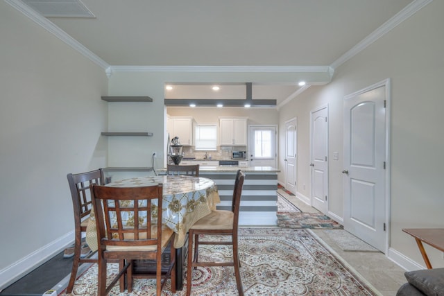 105 David Bolin Dr, La Vergne, TN 37086 - dining space with visible vents, baseboards, and ornamental molding