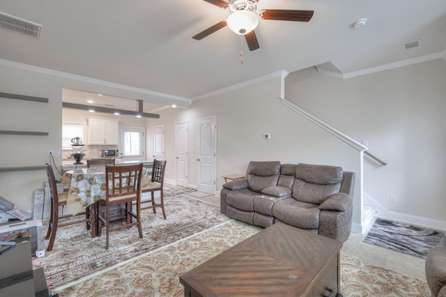 105 David Bolin Dr, La Vergne, TN 37086 - living room featuring light tile patterned floors, visible vents, ceiling fan, and ornamental molding