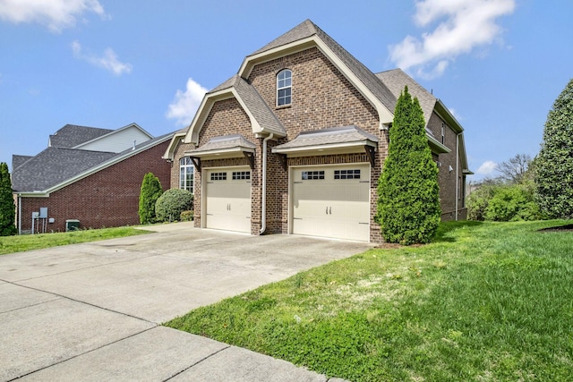 2821 Brentwood Knoll Ct, Nashville, TN 37211 - view of front of house with brick siding, concrete driveway, a garage, a front yard, and roof with shingles