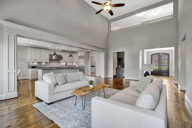 2821 Brentwood Knoll Ct, Nashville, TN 37211 - living room featuring a ceiling fan, french doors, wood finished floors, a towering ceiling, and baseboards
