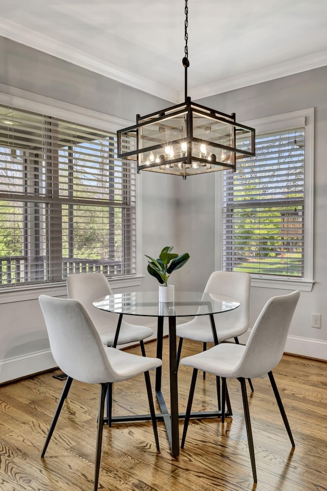 2821 Brentwood Knoll Ct, Nashville, TN 37211 - dining space featuring a chandelier, crown molding, baseboards, and wood finished floors